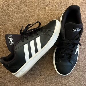 Adidas Black and White Sneakers with Iconic Stripes